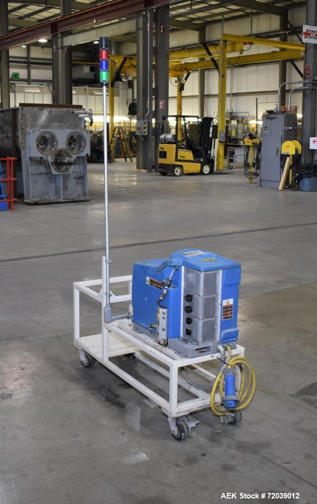 Used Nordson Problue 10 Hot Melt Adhesive Applicator System. Volume 10 liter, melt rate per hour 24 pound, throughput per hour 27.3 pound. Mounted on painted carbon steel frame with casters. Serial# ...